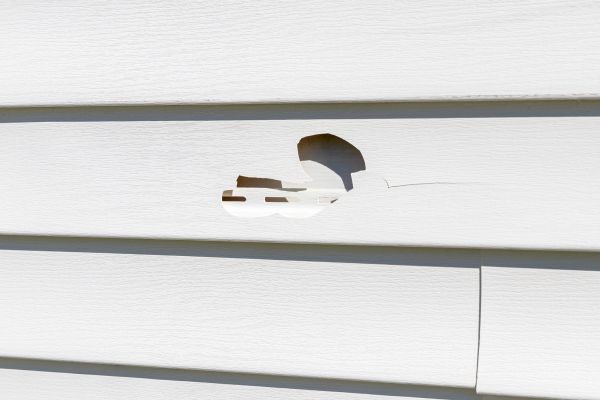 White Vinyl Siding Repair in Roseville